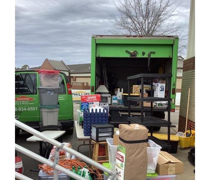 items form Nettleton concession stand outside with SERVPRO trucks in the background 