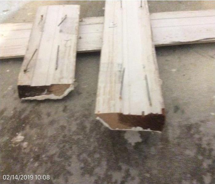 pieces of wood removed from drywall that was affected by water 